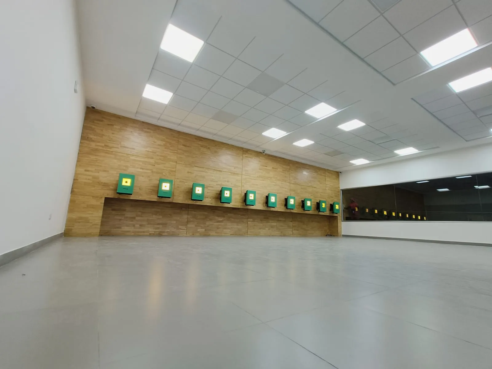 Tachus 10 electronic target systems installed across an indoor 10 m shooting range