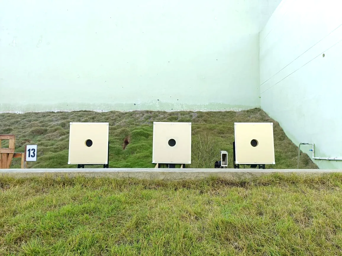Three Tachus 50/10 Hybrid target units installed at an outdoor shooting range