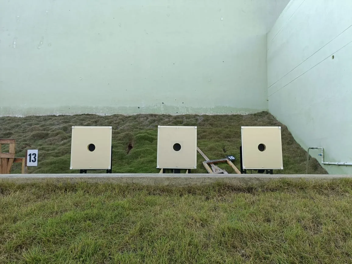 Three Tachus 50/10 Hybrid target units on their stands at an outdoor range