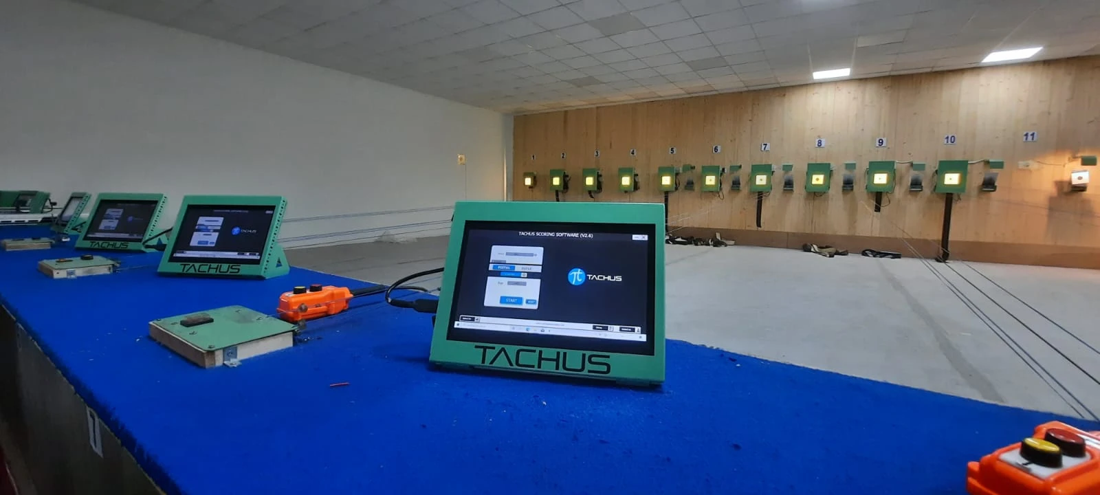 Tachus monitors for lane control on the firing line of a range with multiple lanes